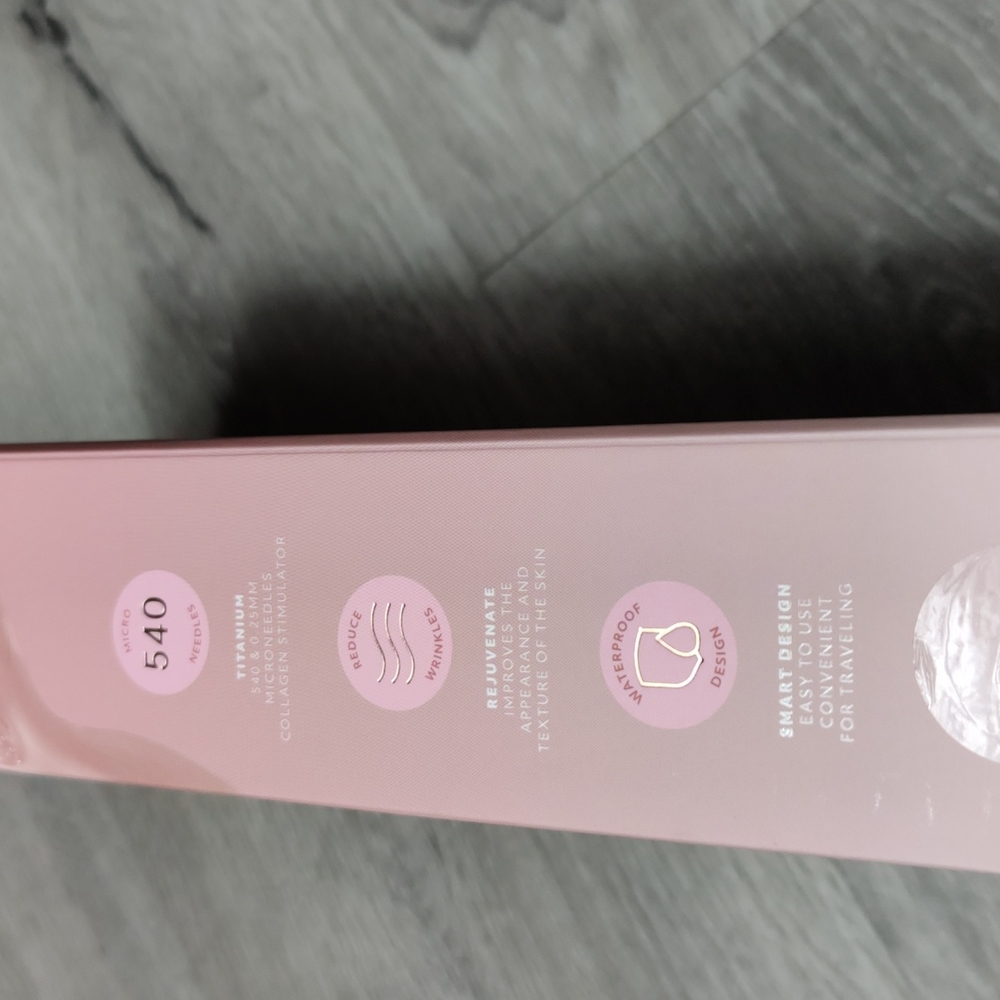 NIB Brookstone Titanium Microneedling Derma Facial Skincare Roller - Picture 7 of 8